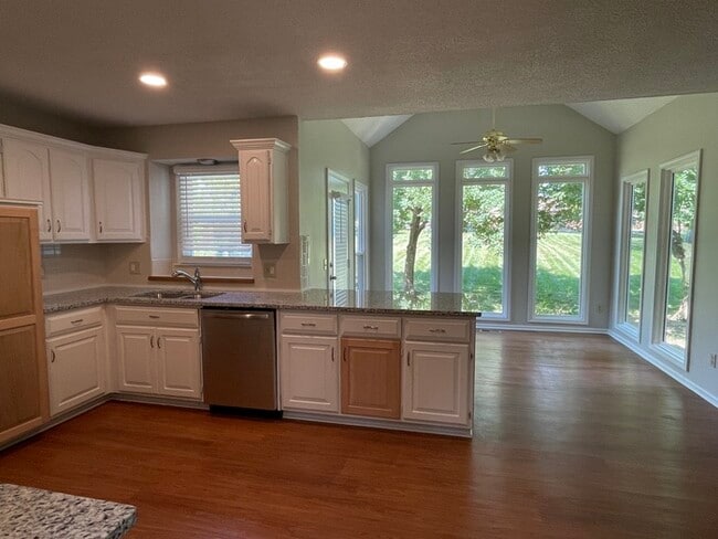 Photo - Welcome to this stunning 4-bedroom, 2.5-bathroom home located in the desirable Overland Park.