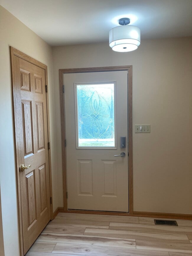 Front Door/Foyer/Coat Closet - 412 11th Cir SE Unit Iron Lake Estates
