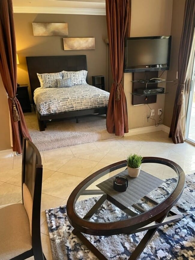 Photo - Meridian STUDIO Condo Fully Furnished near Main Pool-Lush Green trees in Resort Style Community.