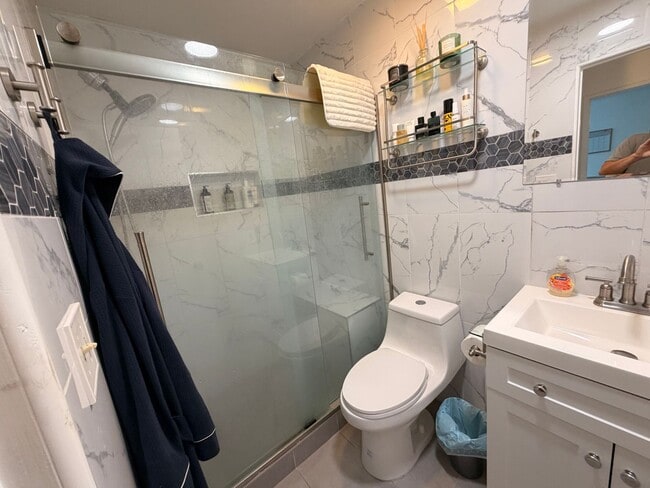 Photo - Spacious Westside 2 Bedroom with Balcony, Upgraded Bathrooms & 2 Gated Parking Spaces