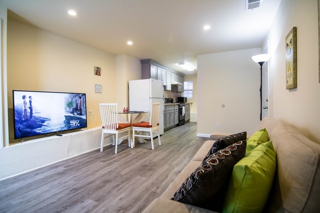 Open living room area from a private entrance - 267 Irvington Street Apartments Unit Ground Floor