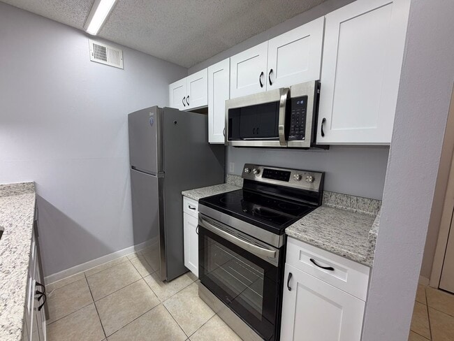 Photo - 4BR/4BA Condo off SW 34th Street - available NOW!