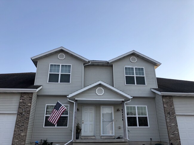 Building Front (5133 on right) - 5133 Horned Owl Dr Townhome