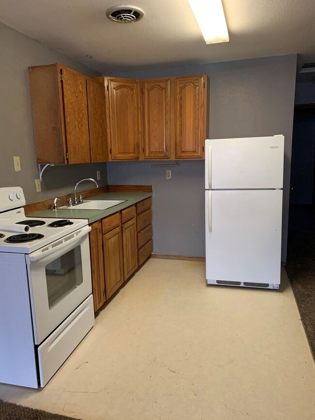 Building Photo - 1217 W Woodin Ave Unit 6