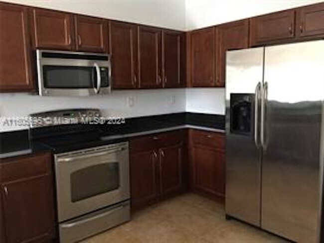 Photo - 8899 NW 107th Ct Condominio Unidad 215