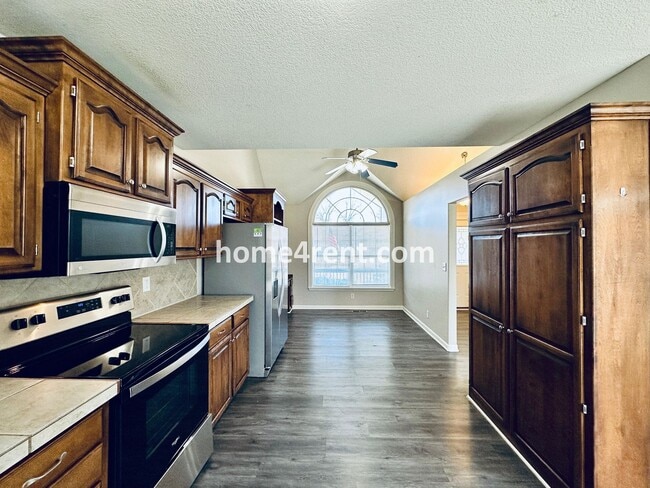 Photo - Spacious Four Bedroom Northland Home with a Finished Basement, 3 car garage and Fenced Yard!