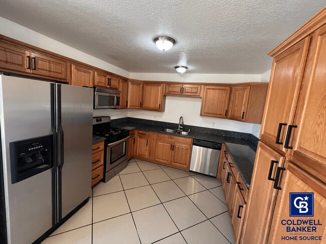 Photo - Move-In Ready Beauty with Granite Kitchen, Stainless Steel Appliances & Expansive Backyard
