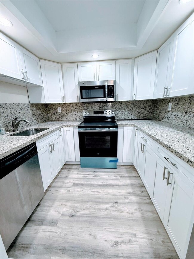 Building Photo - 8830 SW 123rd Ct Unit I201