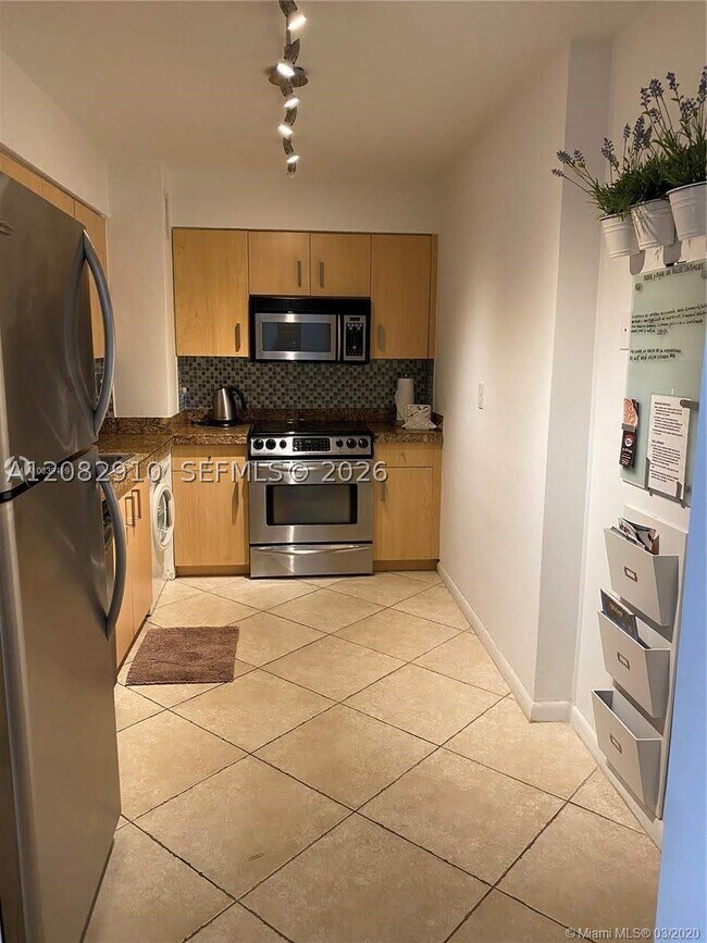 9195 Collins Ave Unit 414