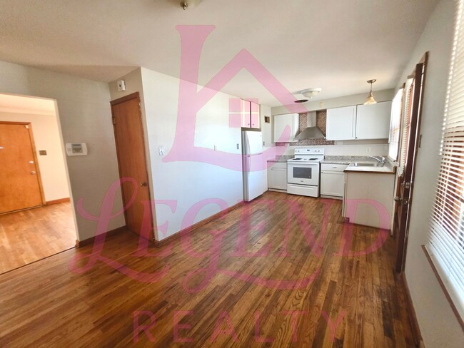 Photo - Move-In Ready 2 Bed Home with Sunroom, Garage & Fenced Yard