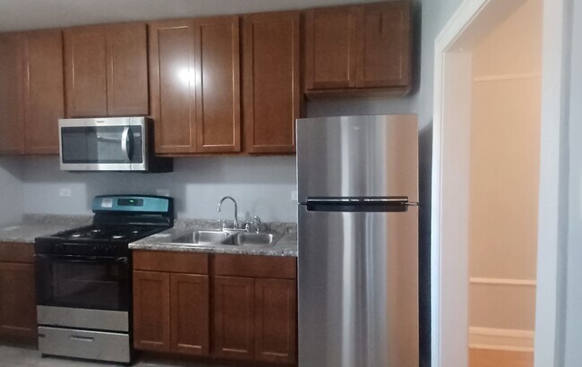 Photo - 7307 S Bennett Ave Unidad 1