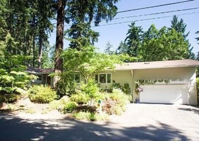 Photo - Spacious & light filled home with a garage, backyard, storage & hardwood floors throughout