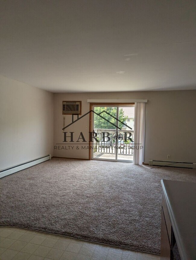 Photo - 2 Bedroom 1 Bath - SPECIAL: Lower rent wit... Unit 115 - 1