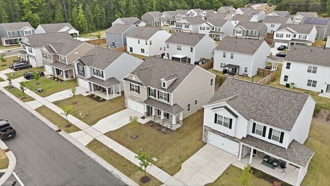 Photo - Spacious 4BR/2.5BA Home in Wendell with Modern Finishes & Open Layout & 2-Car Garage