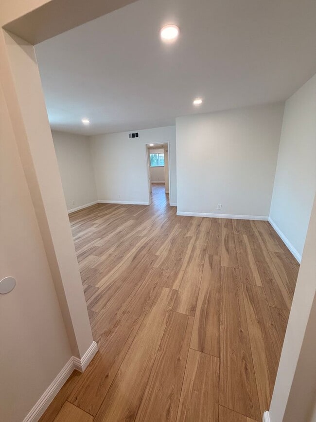 Photo - Completely Remodeled, Spacious 2 Bedroom Apartment For Rent w/ Parking! Unidad E