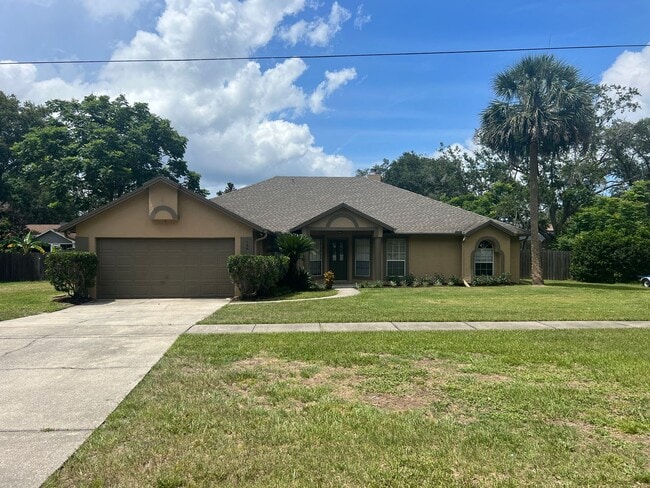 Building Photo - Large 4/2 with 2 Car Garage & Huge Fenced ... Rental