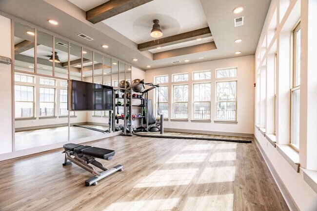 Centro de fitness con estudio de estiramientos