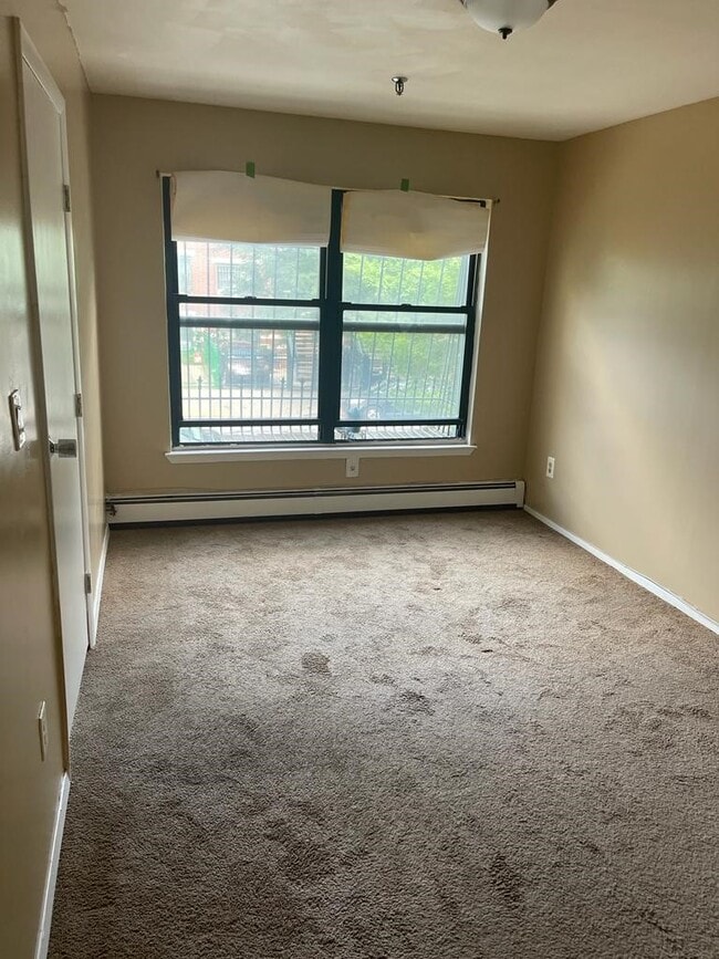 Photo - 940 E 181st St Unit 2