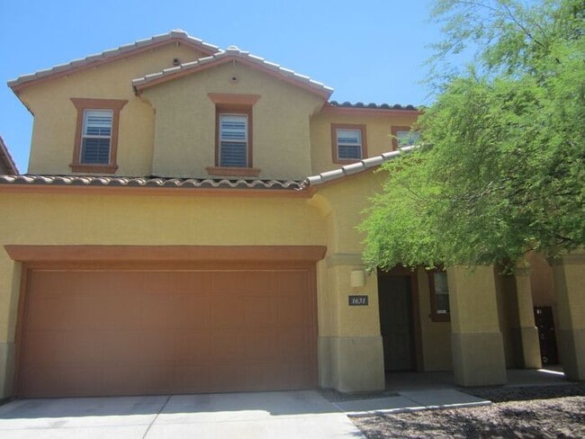 Building Photo - Adorable 2 story patio style with three spacious bedrooms and two full baths upstairs