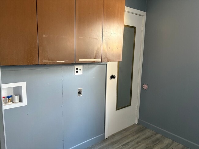 Photo - three bedroom one bath home with attached garage for rent