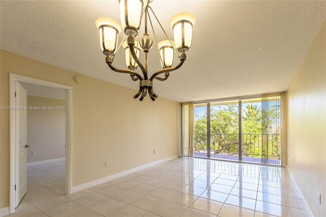 Building Photo - 13120 SW 92nd Ave Unit B408