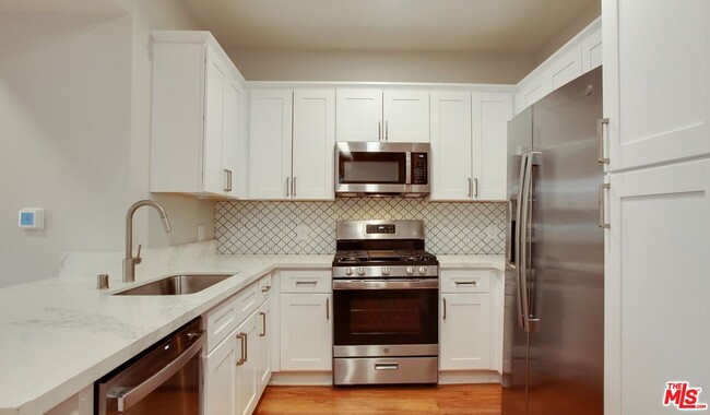 Photo - 5553 W 6th St Apartment Unit 3-311