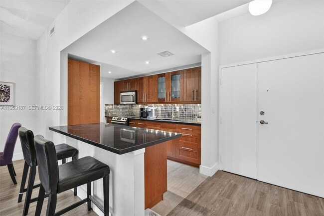 Building Photo - 9725 NW 52nd St Unit 103