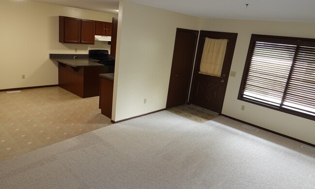 Front room, dining and kitchen - 1610 Helena Rd N