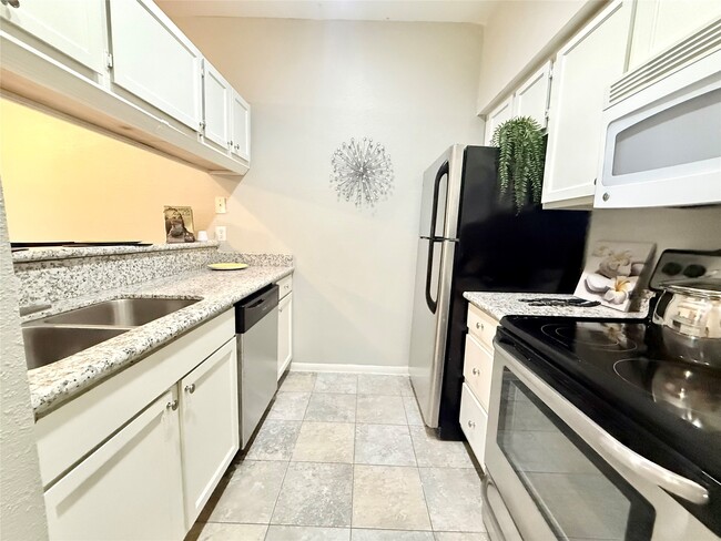 Building Photo - 8055 Cambridge St Unit 65 Rental