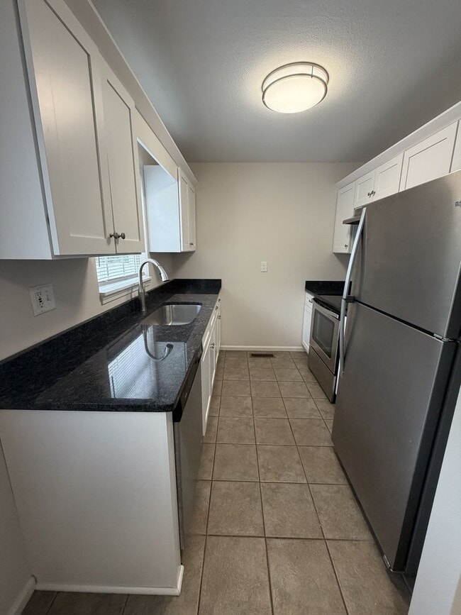 Photo - Spacious 2-Bedroom Townhouse with Garage