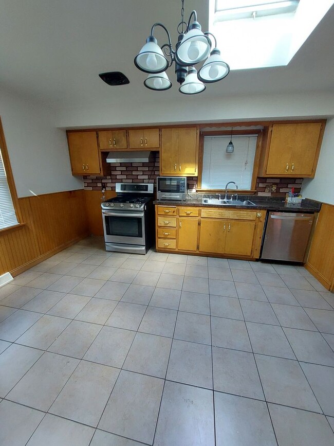 Photo - Corner lot with fenced in backyard!