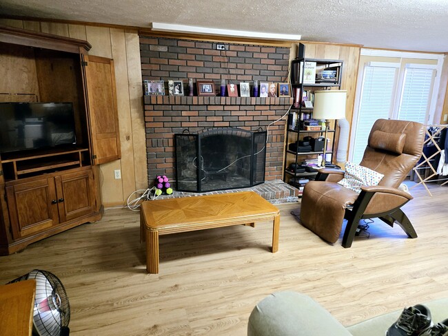 Living area new floors - 3339 Sanford Dr House