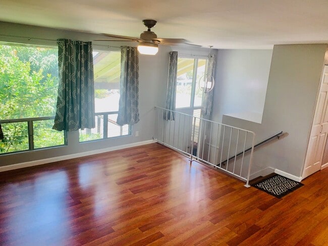 Photo - Spacious upstairs unit. Large Living area. Parking Available