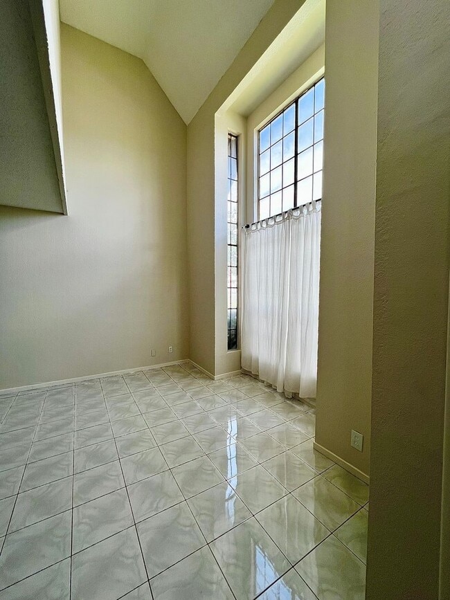 Photo - TWO BEDROOM TOWNHOME WITH VAULTED CEILING AND GRAND FRONT WINDOWS