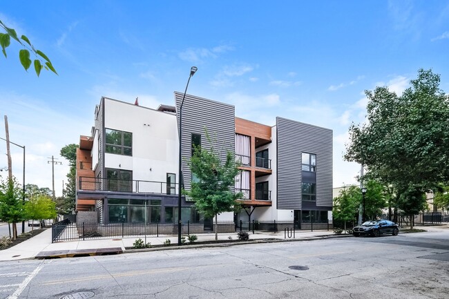 Building Photo - Sleek 2BR Townhome-Style Condo with Rooftop Deck Unit 8