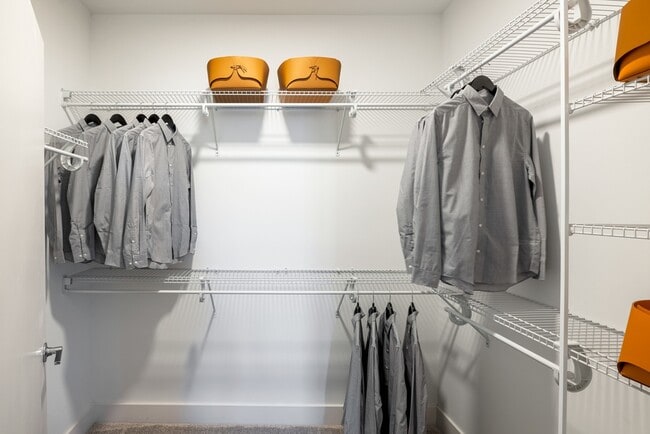 Organize in style with Modera Montville's built-in shelving and spacious linen closets, adding convenience to your living space.