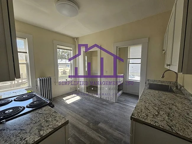 Photo - 5-Bedroom, 1-bathroom Unit available in Do... Unit 64 Sixth Street