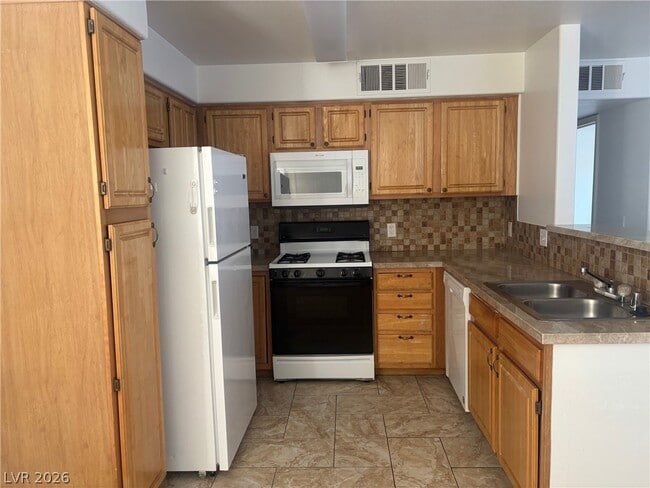 Building Photo - 5710 E Tropicana Ave Unit 2054