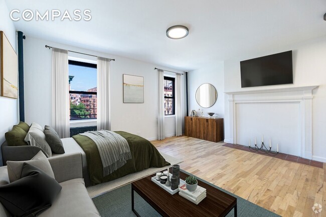 Building Photo - 400 E 9th St Unit 4B Rental