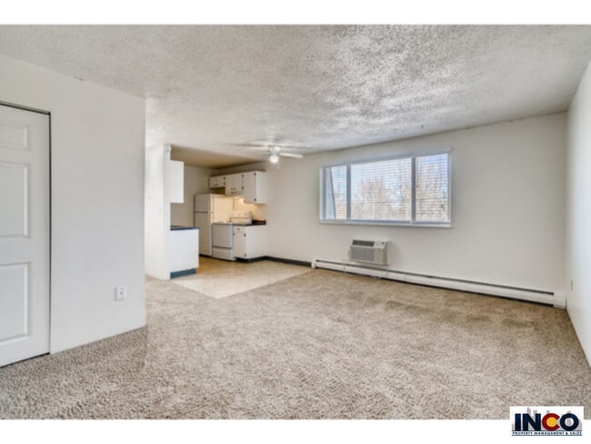 Building Photo - 3670 S Lowell Blvd Unit 112