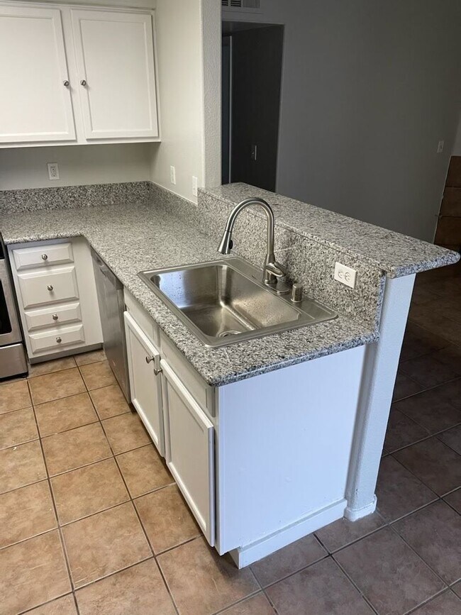 Photo - PRIVATE COMMUNITY WHICH INCLUDES POOLS AND...