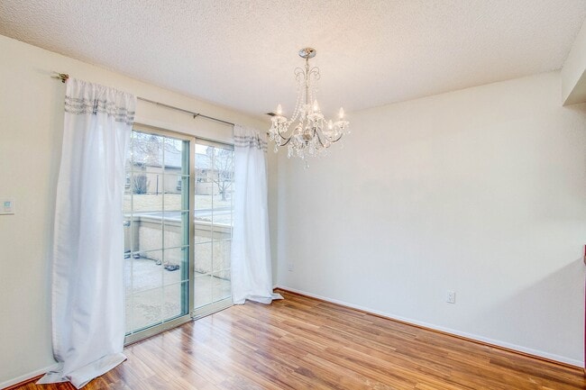 Photo - Impeccably Maintained End Unit Townhome with 2-Car Garage: Effortless Comfort & Convenience Await!