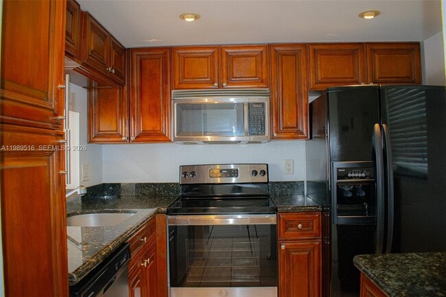 Building Photo - 9230 Lagoon Pl Unit 411