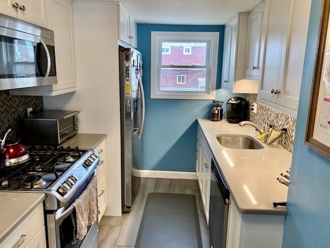 Recently updated galley-style kitchen - 4 Curry Ave