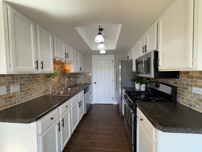 Galley Kitchen (All New Appliances) (1st floor) - 16414 Brementowne Rd