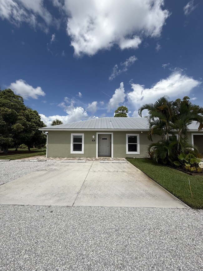 Private reserved parking adjacent to each Villa. - 928 NW Spruce Ridge Dr