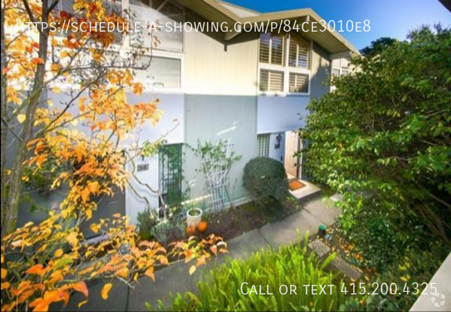 Building Photo - Unwind in a 2-bed, 2-bath retreat with mes... Rental