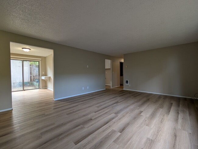 Photo - Bright 3 bedroom/ 1 bathroom Duplex with a fireplace and covered parking!