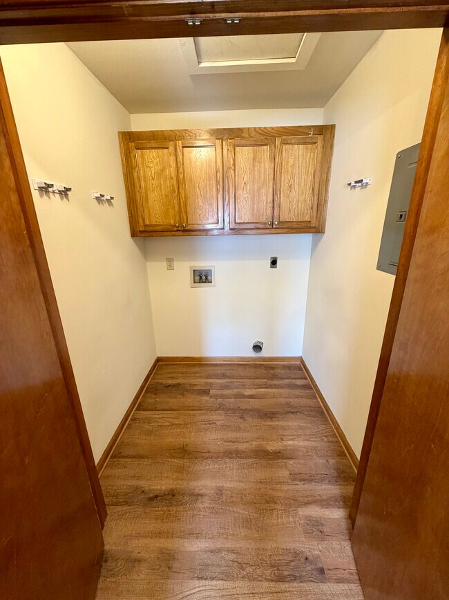 Laundry room with storage - 29604 Burns Ln Unit D