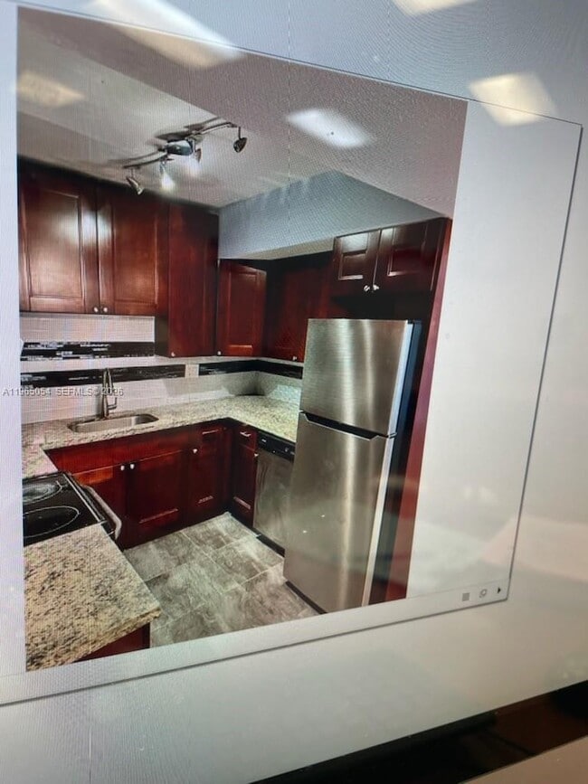 Photo - 11101 Royal Palm Blvd Unit 204